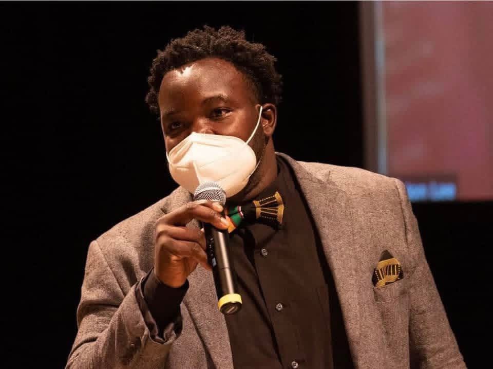 Prince Botchway with a colleague on stage